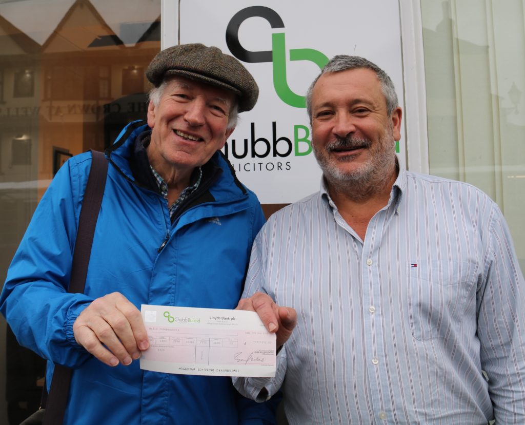 £350 cheque presented to Wells Soup